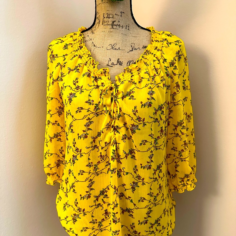 Summer gauze fabric sheer blouse. Gathered neck with lace up front.